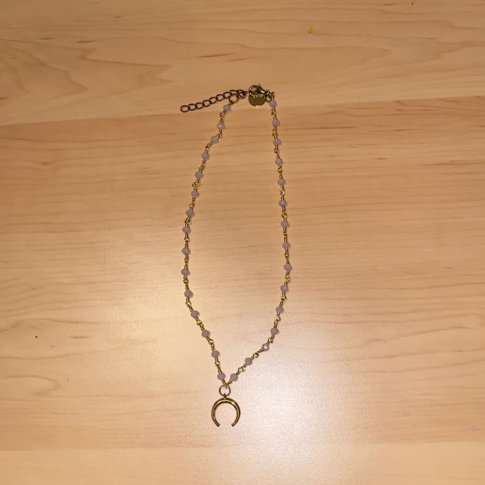 Crescent moon and beaded necklace